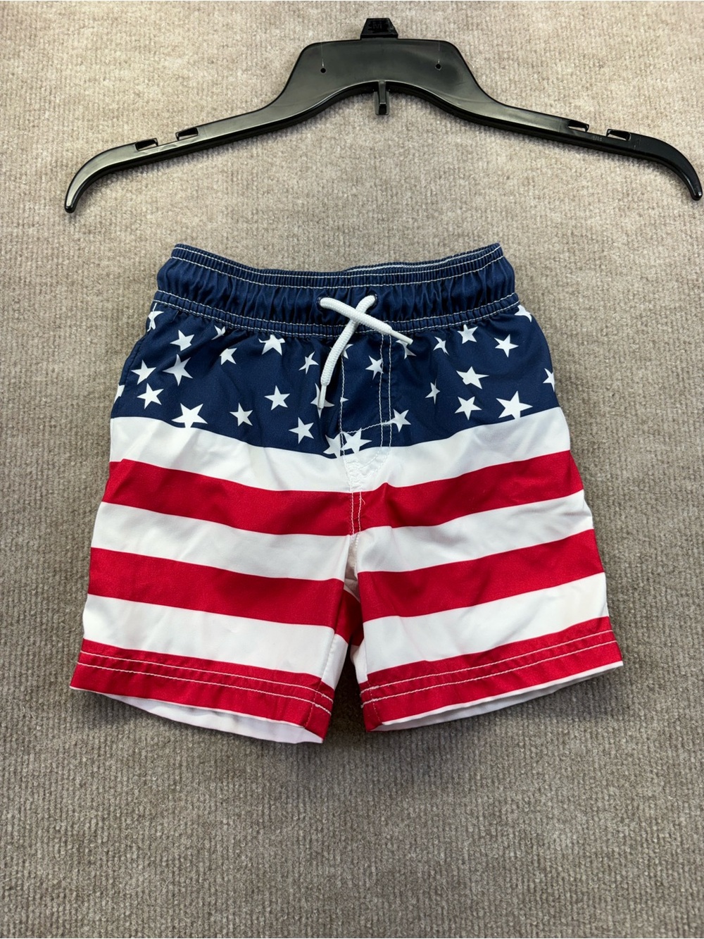 Oshkosh swim trunks in patriotic print size 3T